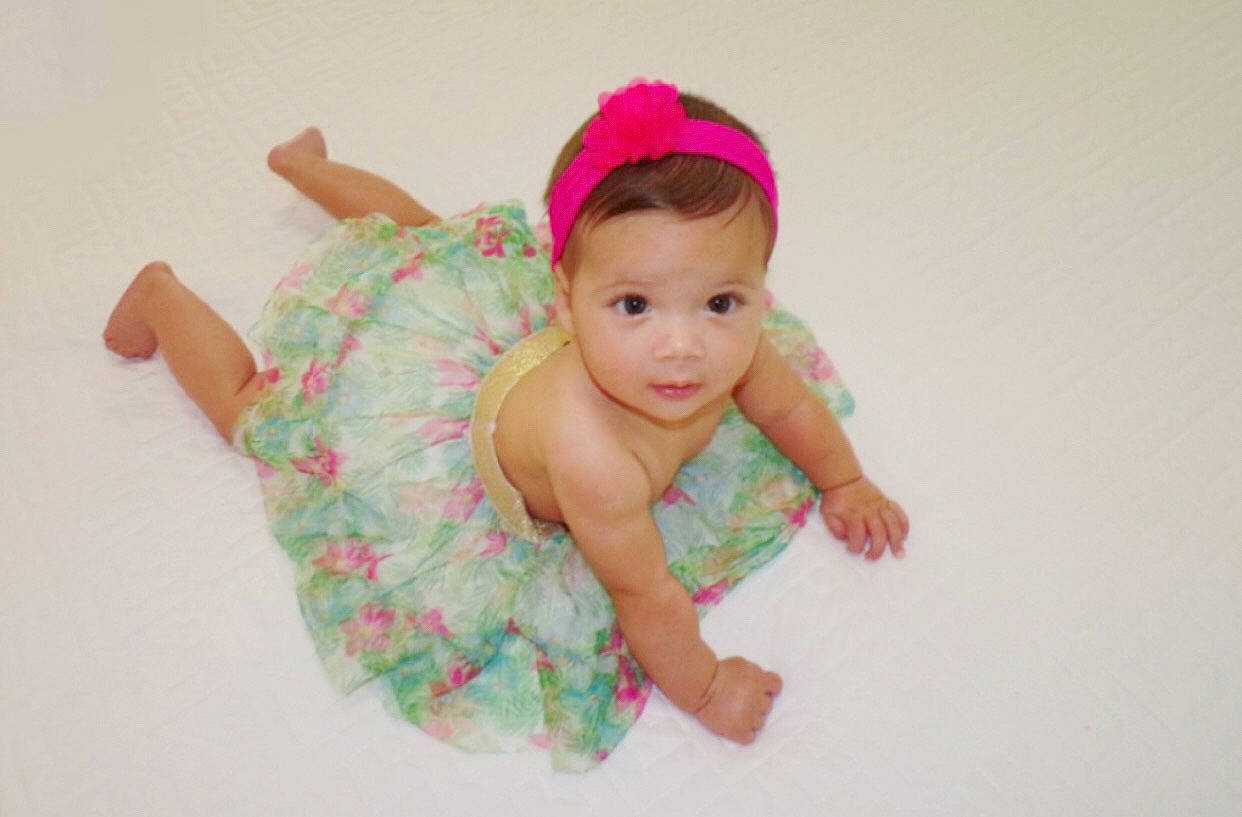 Montserrat joined the competition — help win amazing prizes! baby, baby_products, baby_toddler_clothing, cap, cheek, dress, flooring, fun, happy, linens, magenta, nail, pattern, person, pink, skin, sleeve, smile, t_shirt, thumb