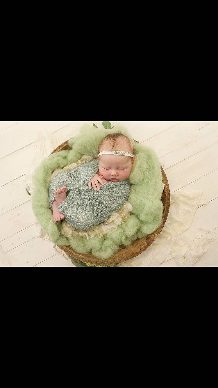 Alaiyah is registered to the contest to win money with this photo: baby, child, fur, green, person
