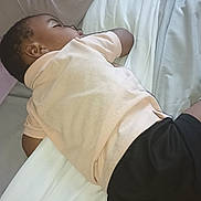 Elijah joined the competition — help win amazing prizes! child, sleeping, bed, pillow, blanket, shirt, shorts, rest, indoors, peaceful, nap, young, person, relaxation, comfort, home, soft, cozy, clothing, lying_down