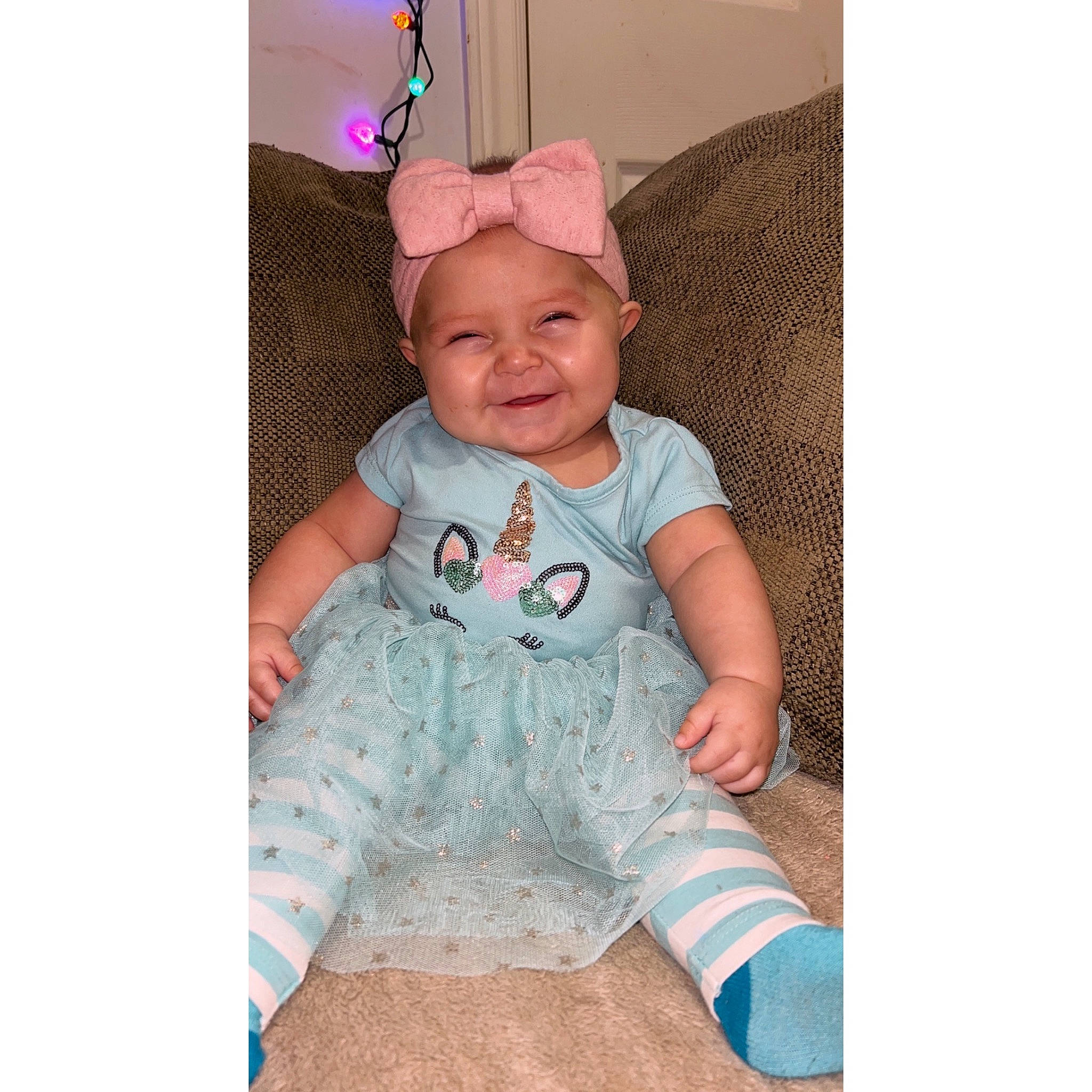 Maelynn joined the competition — help win amazing prizes! baby, baby_products, baby_toddler_clothing, cap, costume_hat, fashion_accessory, font, happy, headwear, joy, laugh, linens, magenta, party_hat, party_supply, pattern, person, pink, sitting, sleeve