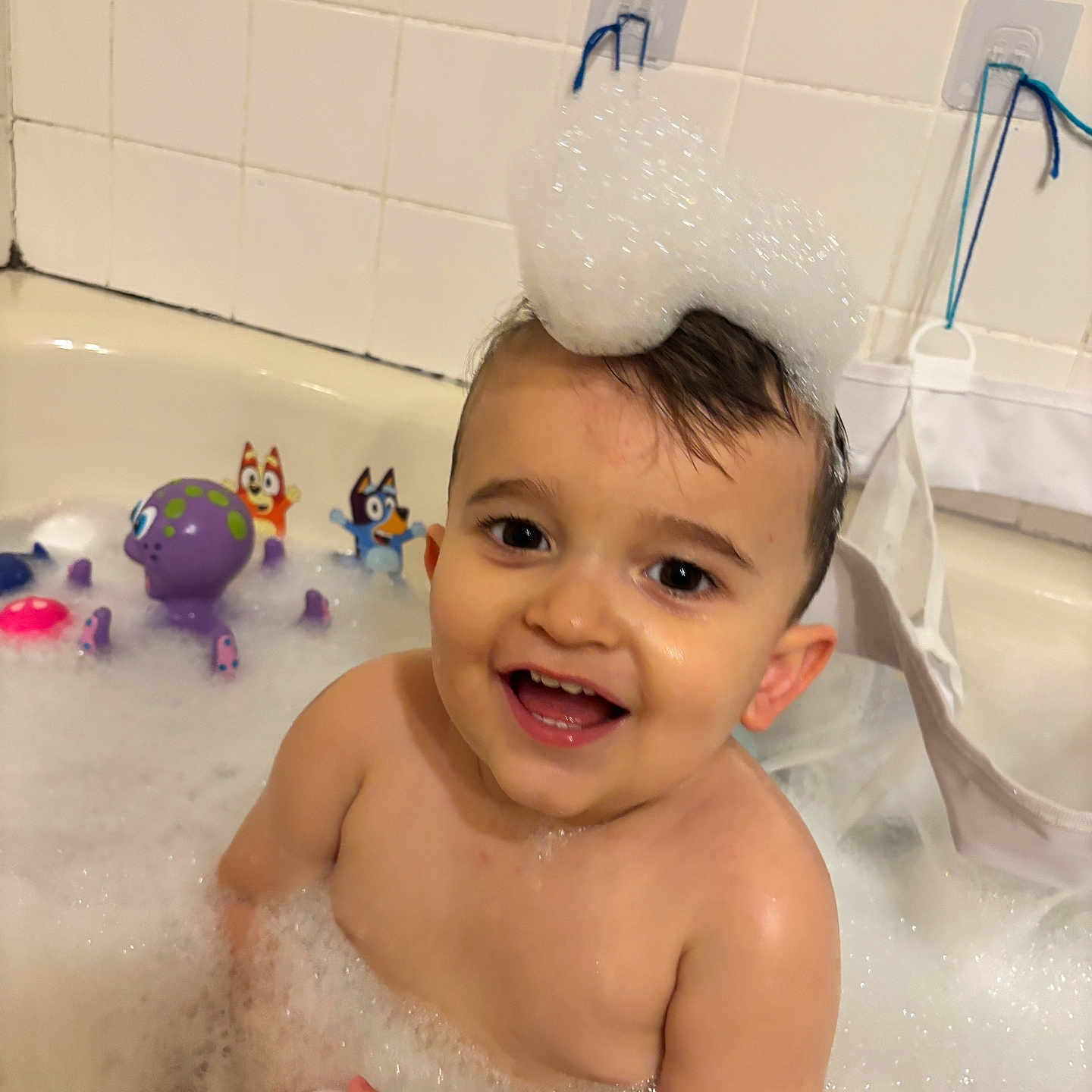 Yamari joined the competition — help win amazing prizes! baby, bath, bathroom, bathtub, bubbles, child, cute, foam, fun, happy, head, indoors, playful, skin, smiling, tile, toddler, toy, water, wet