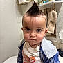 Yamari is registered to the contest to win money with this photo: toddler, child, face, hairstyle, mohawk, expression, clothing, shirt, jacket, bathroom, toiletries, towel, shelf, plaid, indoor, person, young_child, portrait, casual, cute