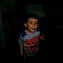 Yamari joined the competition — help win amazing prizes! child, boy, tshirt, spiderman, face, funny_face, indoor, dark, shadow, person, pants, standing, expression, casual_clothing, home, hand, footwear_absent, playful, portrait, young