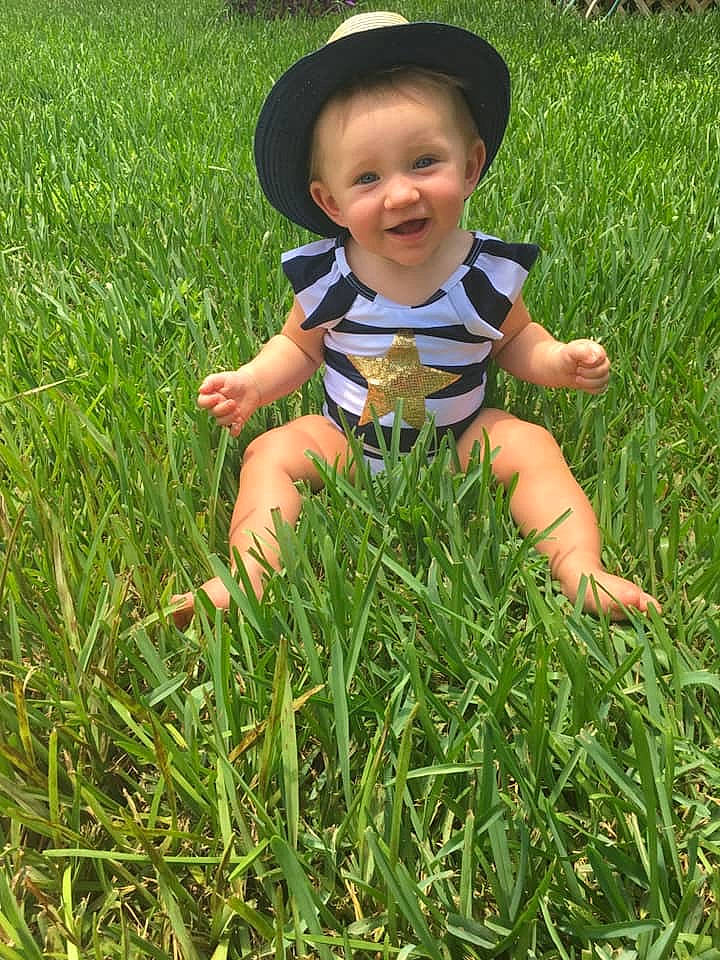 Lyanna joined the competition — help win amazing prizes! child, crop, finger, flower, fodder, grass, grass_family, grassland, happy, lawn, leaf, meadow, people_in_nature, person, plant, play, smile, summer, toddler