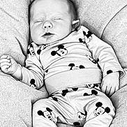 Emilio participe au concours pour gagner de l'argent avec cette photo : baby, sleeping, mickey_mouse, pajamas, infant, blanket, soft_texture, clothing, cute, resting, newborn, child, comfort, portrait, cozy, peaceful, small_hands, closed_eyes, indoors, relaxation