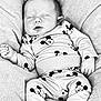 baby, sleeping, mickey_mouse, pajamas, infant, blanket, soft_texture, clothing, cute, resting, newborn, child, comfort, portrait, cozy, peaceful, small_hands, closed_eyes, indoors, relaxation