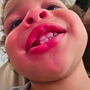 Oliver is registered to the contest to win money with this photo: candid, child, close_up, curly_hair, cute, detail, expression, face, indoor, innocence, lips, mouth, nose, person, playful, portrait, skin, soft_light, teeth, young