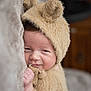 Amari is registered to the contest to win money with this photo: baby, infant, fuzzy_hat, bear_costume, cute, smiling, hand, blanket, soft_texture, cozy, portrait, child, warm, indoors, sleepy, cuddle, face, closeup, adorable, young