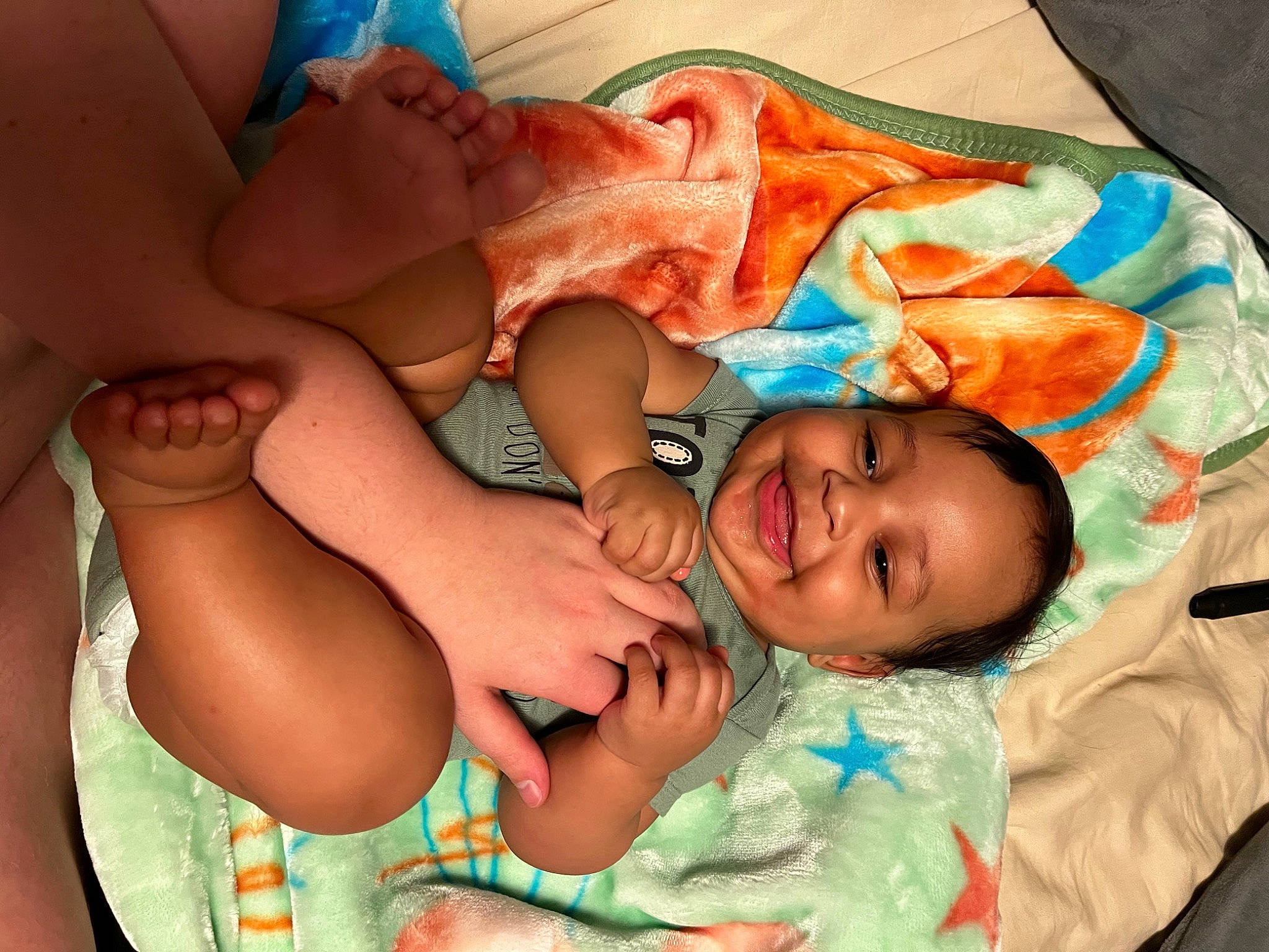 Zakari joined the competition — help win amazing prizes! abdomen, baby, baby_toddler_clothing, cheek, child, comfort, eye, finger, gesture, happy, head, human_leg, joy, linens, mouth, nail, person, skin, smile, thigh