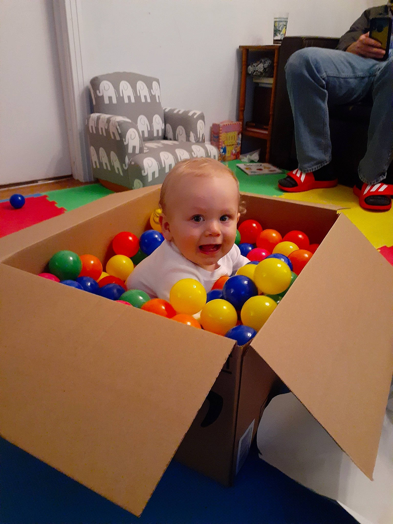 Creedence is registered to the contest to win money with this photo: baby, baby_playing_with_toys, baby_toys, ball, ball_pit, child, fun, games, leisure, person, play, room, table, toddler, toy