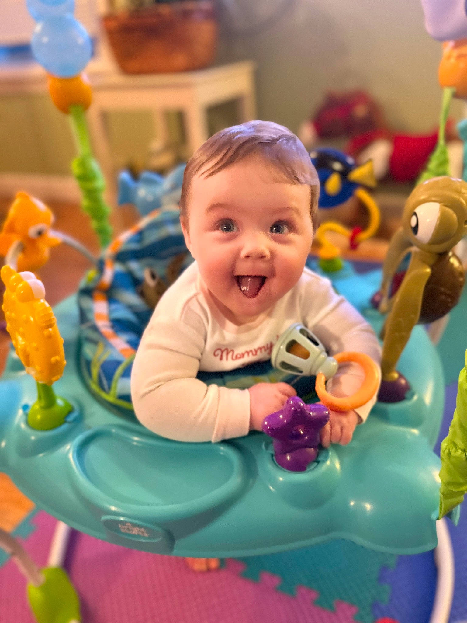 Lorelei is registered to the contest to win money with this photo: baby, child, event, eye, fun, green, happy, leisure, party_supply, people, person, photograph, pink, product, purple, riding_toy, smile, snapshot, surprise, toddler