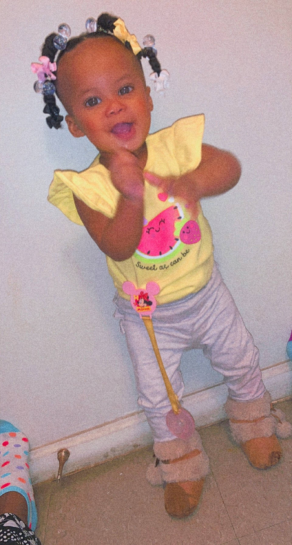 Lay is registered to the contest to win money with this photo: arm, art, baby_toddler_clothing, child, costume, fashion_accessory, fun, gesture, happy, head, headband, headgear, headpiece, magenta, person, pink, play, sleeve, smile, standing