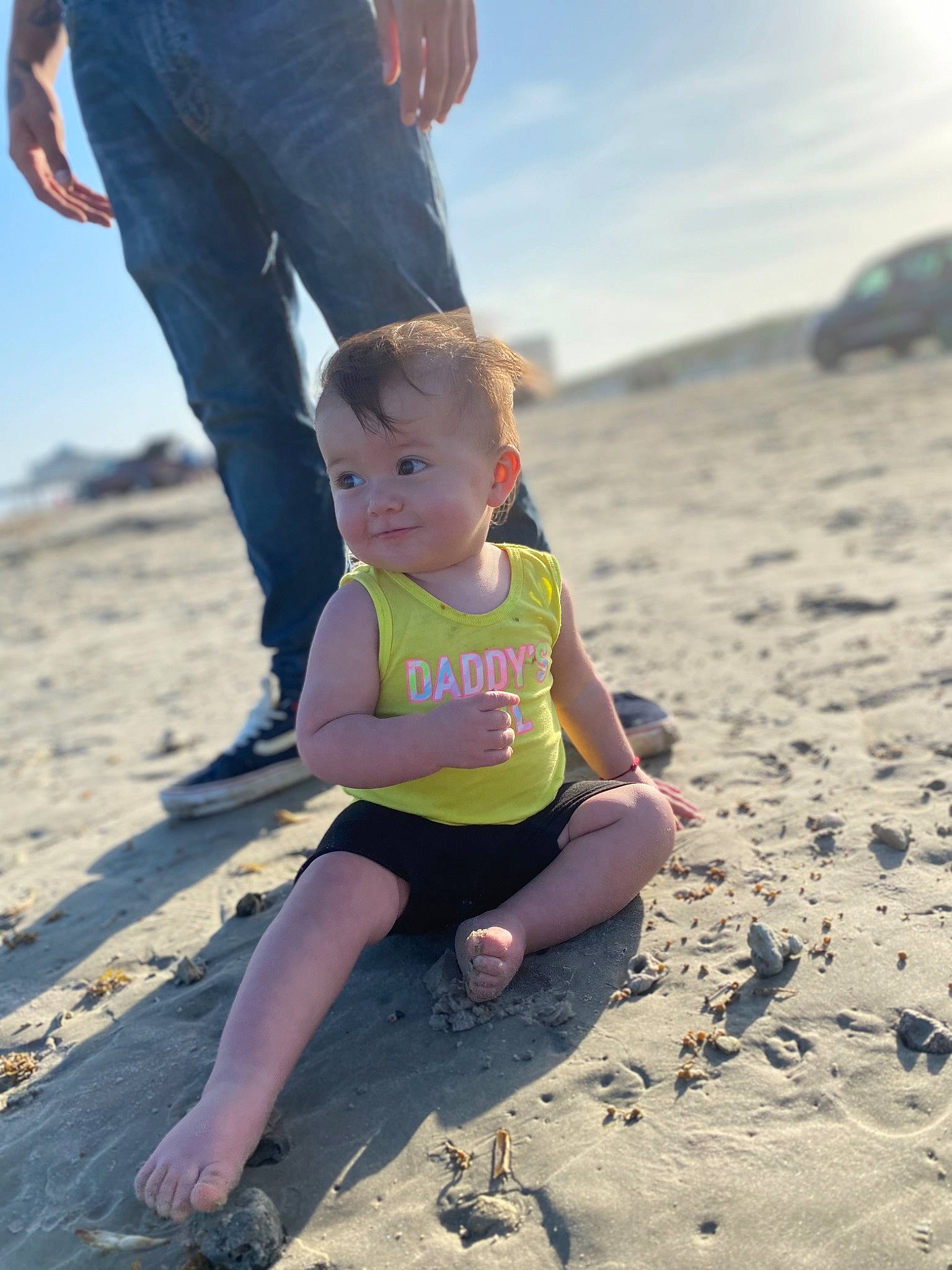 Ayviana is registered to the contest to win money with this photo: barefoot, beach, body_of_water, child, fun, happy, human_body, landscape, leg, leisure, people, people_in_nature, people_on_beach, person, sand, sky, standing, summer, sunlight, thigh