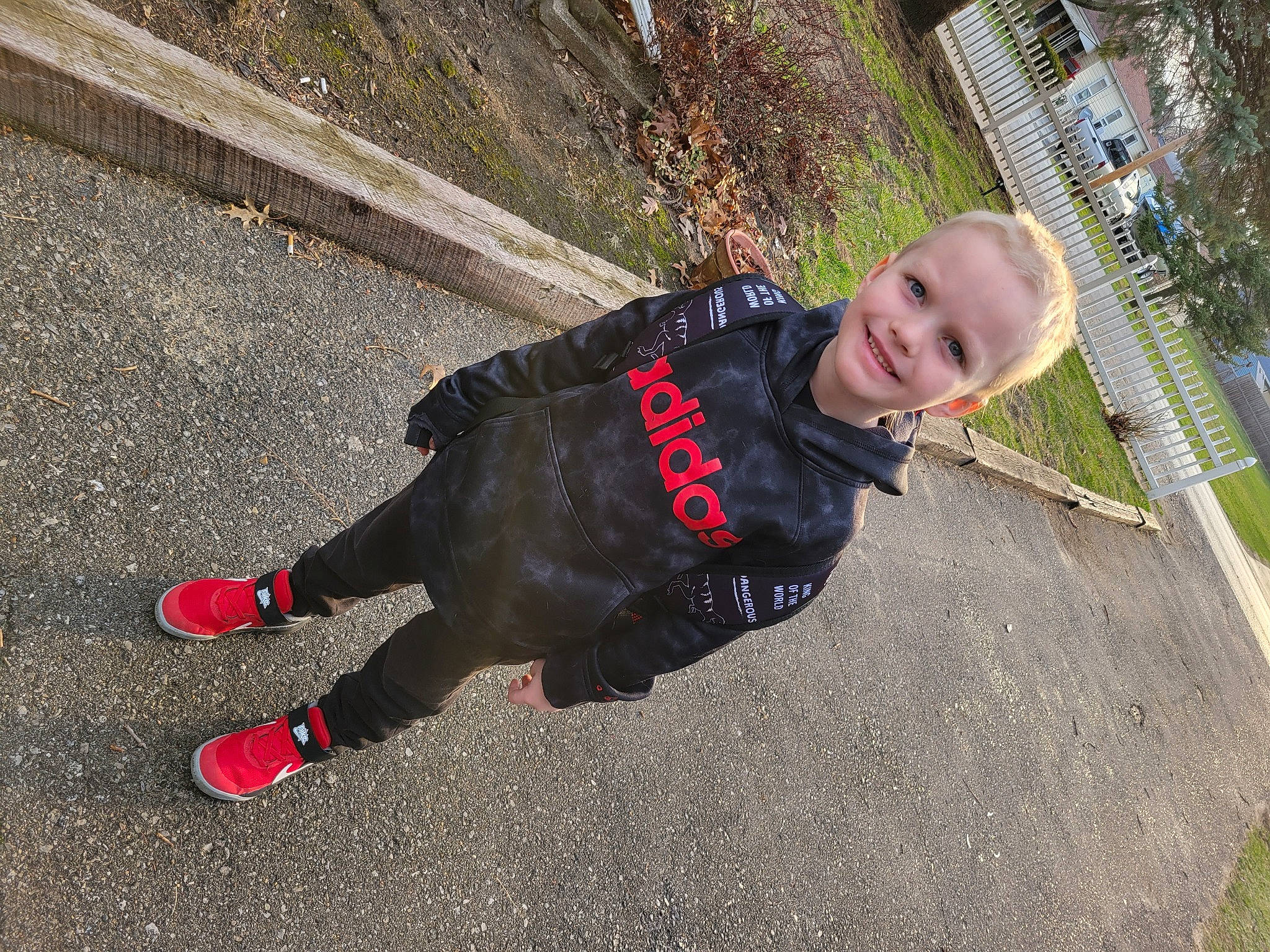 Ronan joined the competition — help win amazing prizes! asphalt, carmine, child, city, concrete, flooring, fun, grass, jacket, joy, leisure, person, plant, recreation, road_surface, sidewalk, sleeve, smile, soil, tar