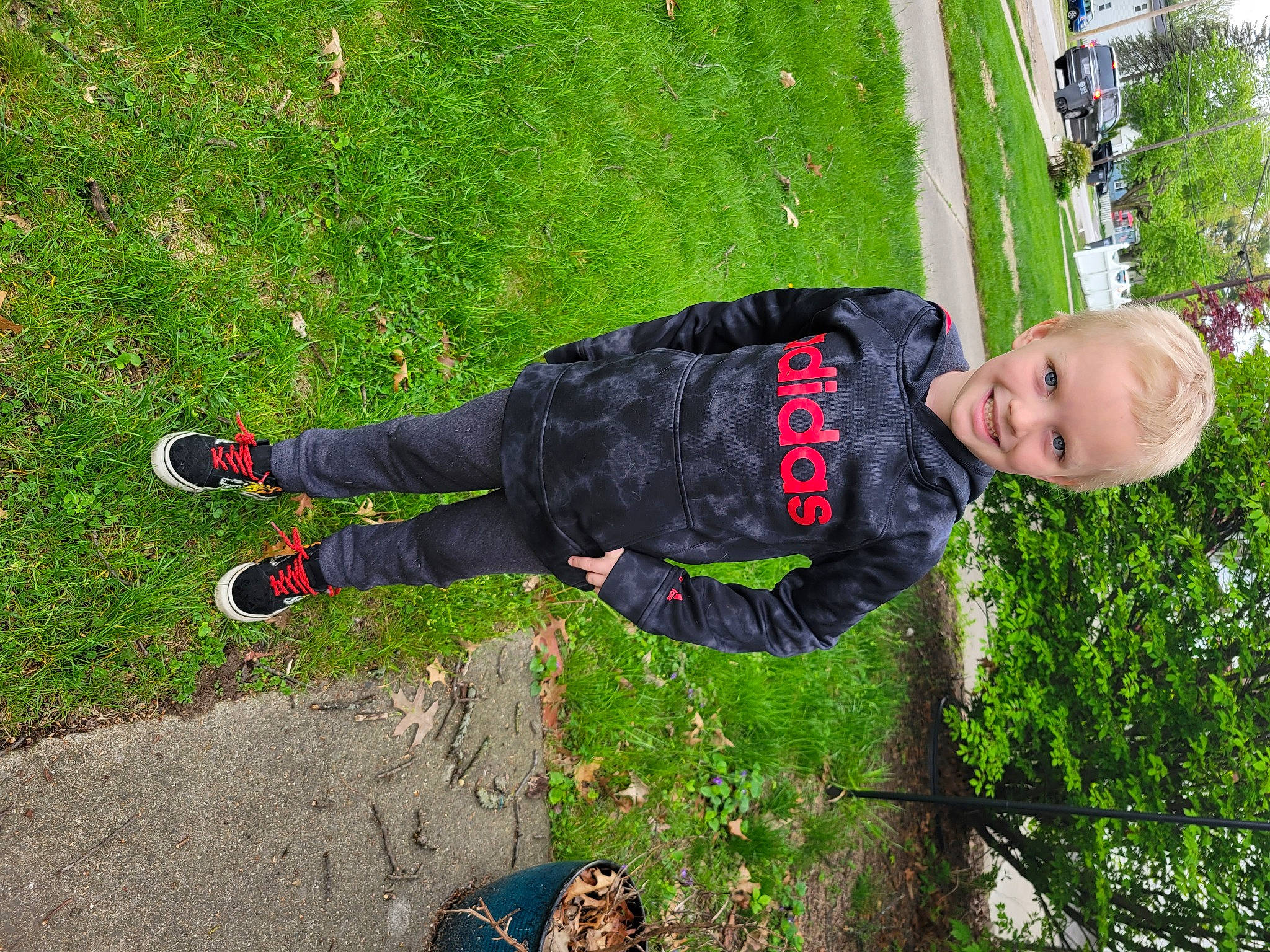 Ronan is registered to the contest to win money with this photo: active_pants, fun, grass, grassland, green, groundcover, joy, leisure, people_in_nature, person, plant, recreation, shadow, toddler, tree, walking_shoe, windbreaker