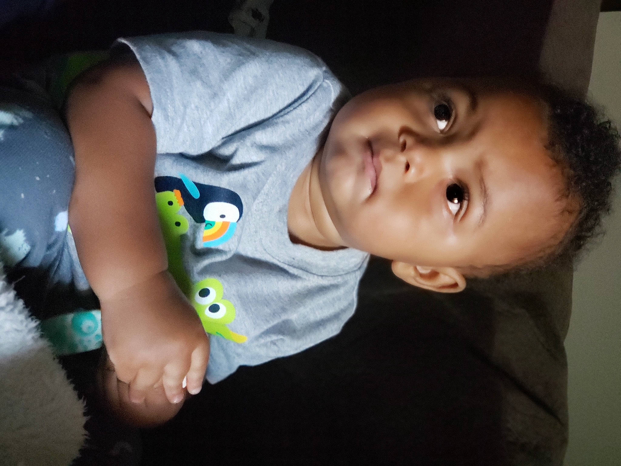 Royce is registered to the contest to win money with this photo: baby, baby_toddler_clothing, cheek, child, cool, elbow, eyelash, finger, flash_photography, fun, grass, happy, iris, mouth, nose, person, sitting, skin, sleeve, t_shirt