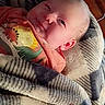 Atlas joined the competition — help win amazing prizes! baby, blanket, child, cute, dinosaur, face, infant, indoors, pattern, plush, portrait, shirt, soft, snug, smile, toddler, toy, warm, wrapped, young