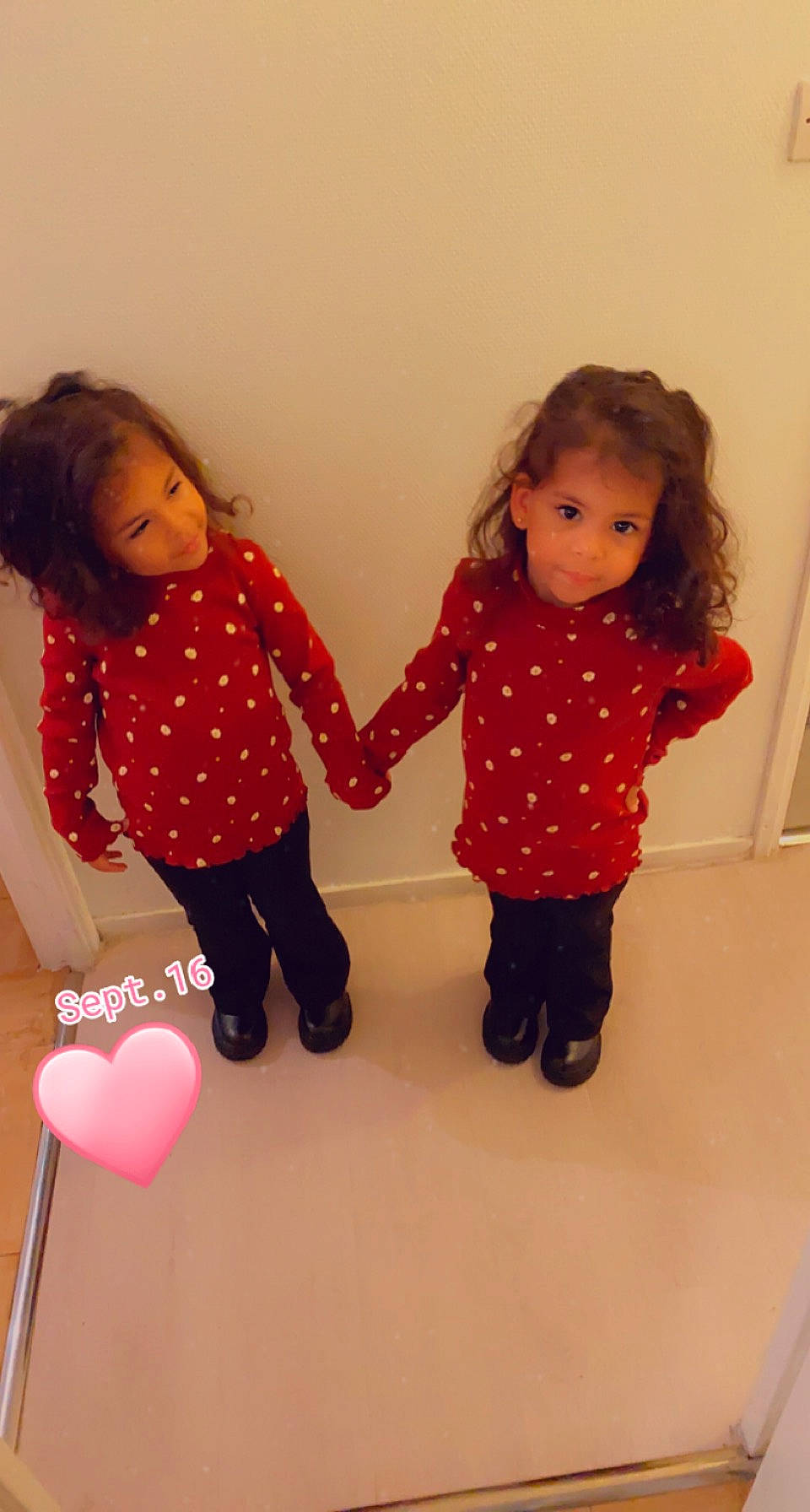 Sya Et Mya participe au concours pour gagner de l'argent avec cette photo : baby_toddler_clothing, cheek, facial_expression, fashion, gesture, hair, hairstyle, happy, head, human, human_body, joint, material_property, outerwear, person, pink, skin, sleeve, standing, textile