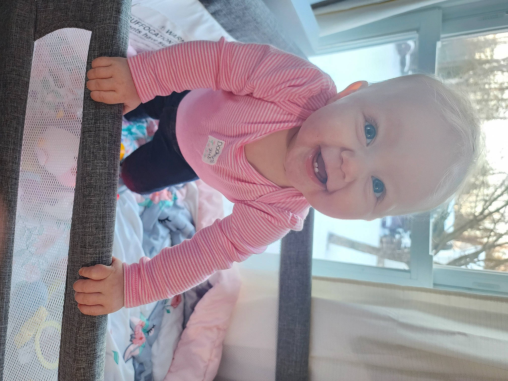 Lydia joined the competition — help win amazing prizes! baby, baby_products, baby_toddler_clothing, child, comfort, fun, happy, magenta, pattern, person, plant, room, smile, suit, toddler, tree, vacation, window, wood