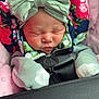 Ivori joined the competition — help win amazing prizes! newborn, baby, sleeping, headband, bow, mittens, car_seat, floral_pattern, blanket, pink, green, cozy, infant, child, face, clothing, safety_belt, portrait, closeup, cute