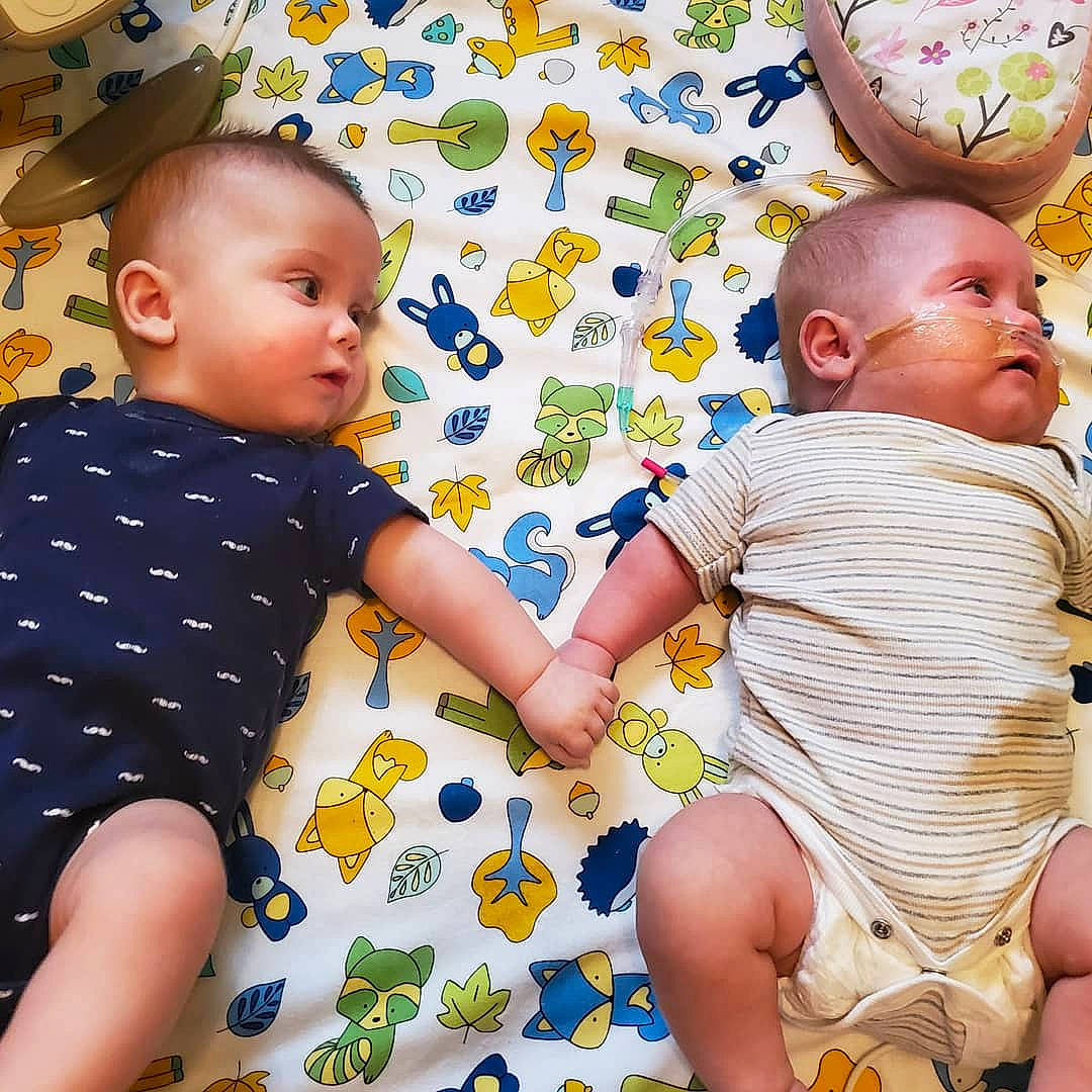 Thatcher joined the competition — help win amazing prizes! baby, baby_products, child, design, family, fun, happy, pattern, person, plant, play, product, room, sibling, sitting, skin, textile, toddler, yellow