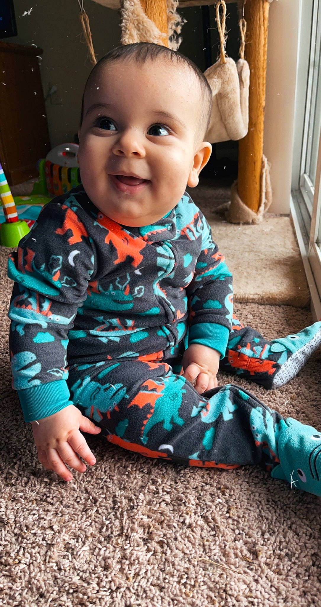 Isaias joined the competition — help win amazing prizes! baby, baby_toddler_clothing, child, nightwear, person, sitting, sleeve, sock, toddler