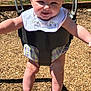 baby, bodypart, clothing, dress, face, finger, grass, hand, head, nature, outdoorplayarea, outdoors, person, photography, plant, playarea, portrait, shorts, swing, toy