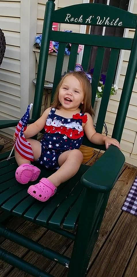 Ansleigh joined the competition — help win amazing prizes! baby, child, child_model, furniture, happy, outdoor_play_equipment, person, pink, play, playground, sitting, smile, swing, toddler