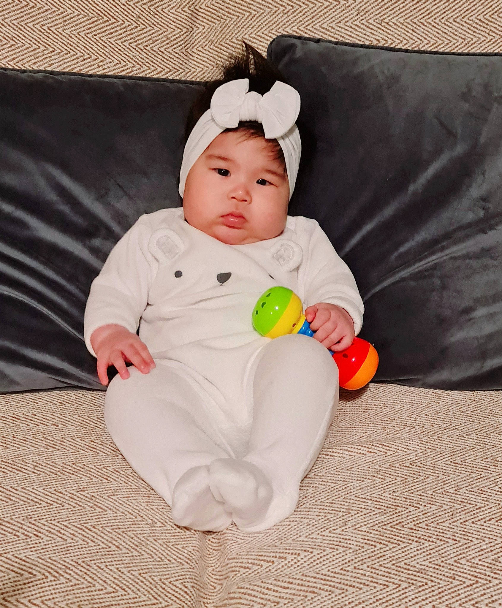 Lyca joined the competition — help win amazing prizes! arm, baby, baby_products, baby_sleeping, baby_toddler_clothing, beanie, child, comfort, couch, eye, flooring, foot, headgear, headwear, human_body, knit_cap, linens, person, sitting, sleeve