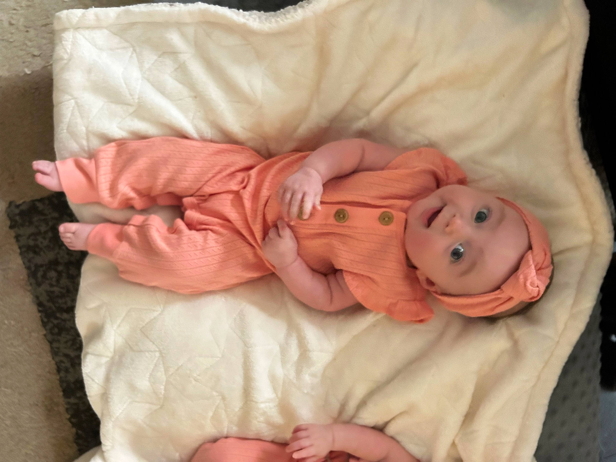 Emilia is registered to the contest to win money with this photo: baby, baby_products, baby_sleeping, baby_toddler_clothing, bed_sheet, bedding, bedtime, cheek, child, comfort, headwear, linens, nap, peach, person, pink, room, skin, sleep, sleeve