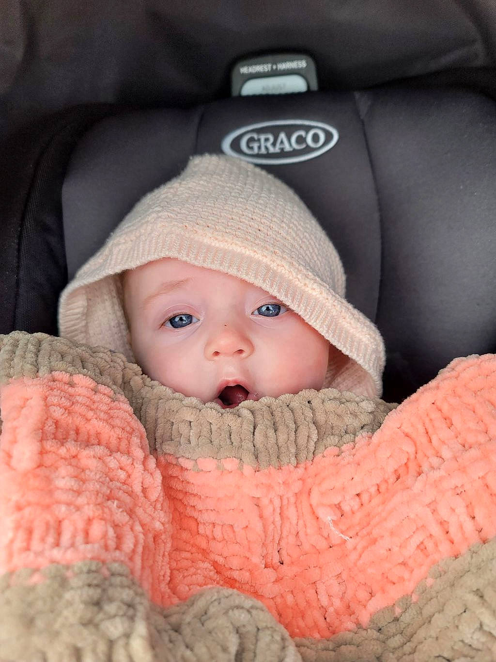 Emilia joined the competition — help win amazing prizes! baby, baby_products, baby_sleeping, baby_toddler_clothing, cap, cheek, child, comfort, face, fashion_accessory, headgear, headwear, knit_cap, outerwear, person, product, sitting, skin, sleeve, toddler