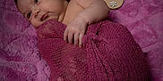 Priscilla is registered to the contest to win money with this photo: baby, blanket, child, cute, face, flower_headband, hand, infant, lying_down, month_marker, newborn, one_month, pink, portrait, purple, skin, sleepy, soft_texture, wooden_sign, wrapped