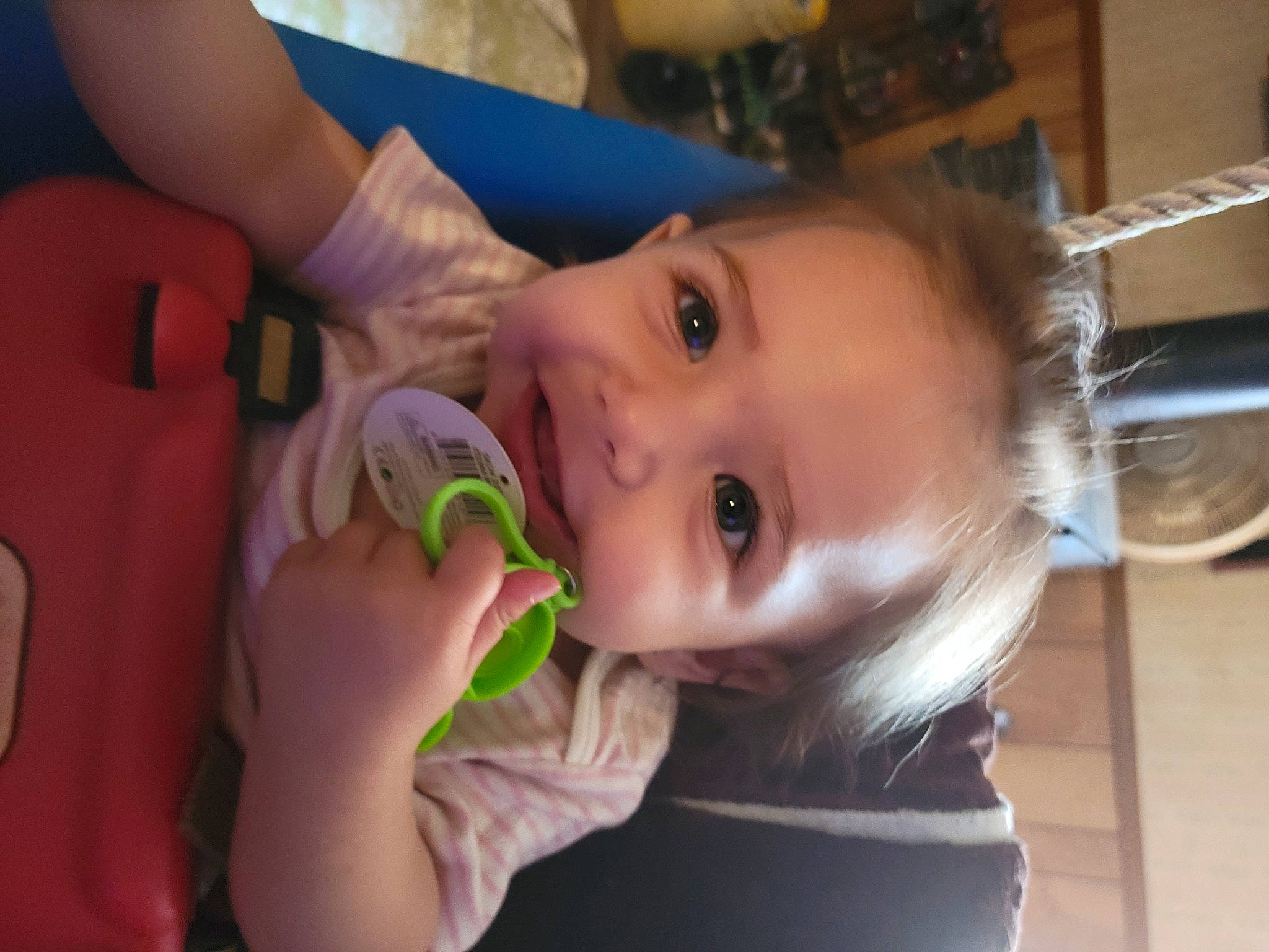 Billie is registered to the contest to win money with this photo: baby, baby_products, baby_toddler_clothing, biting, cheek, child, drinkware, ear, eyelash, finger, gesture, hand, happy, iris, lip, mouth, nose, person, skin, smile