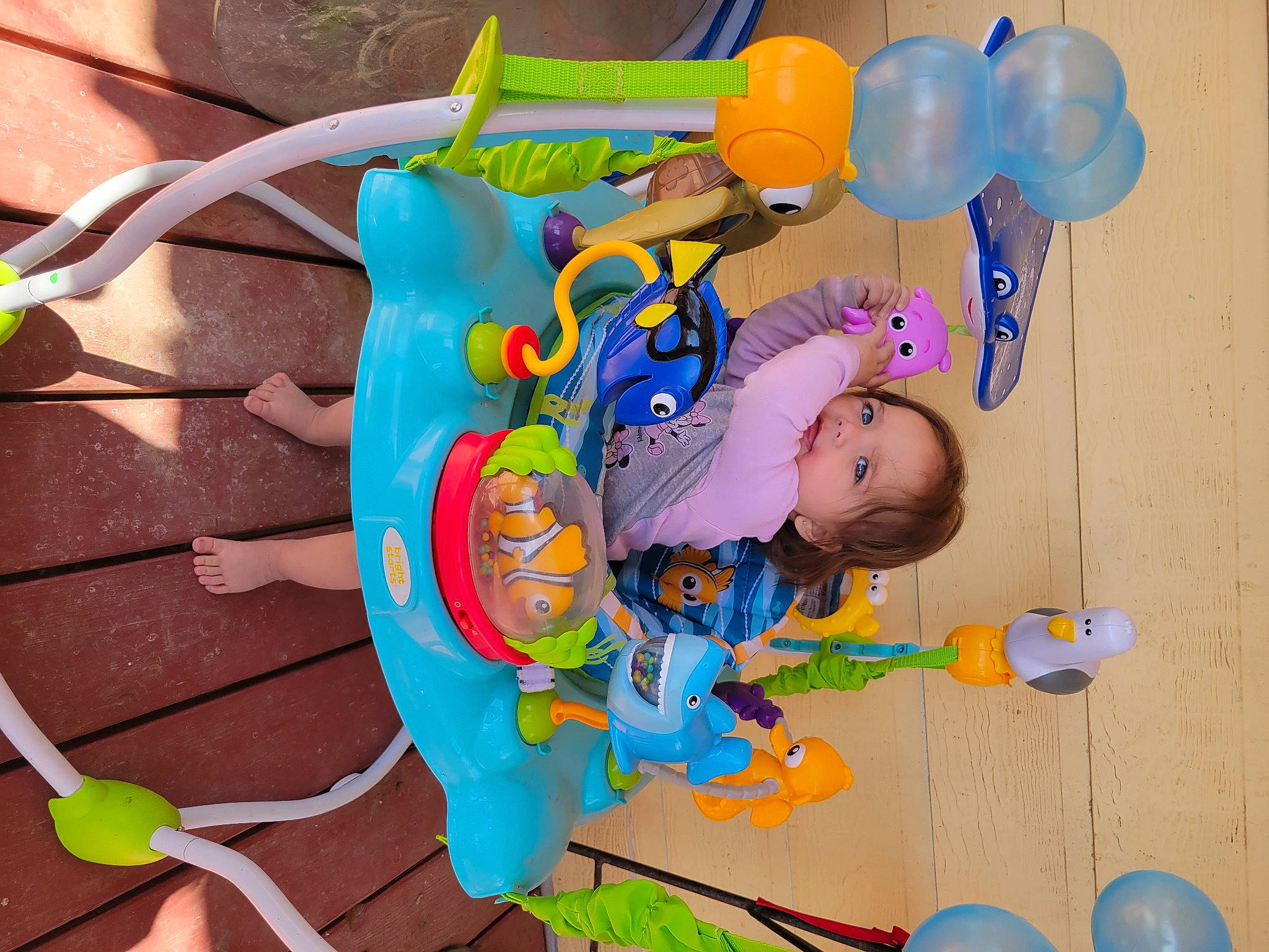 Billie is registered to the contest to win money with this photo: baby, baby_products, baby_toddler_clothing, baby_toys, balloon, blue, child, electric_blue, fun, happy, leisure, party_supply, person, plastic, play, room, toddler, toy, yellow