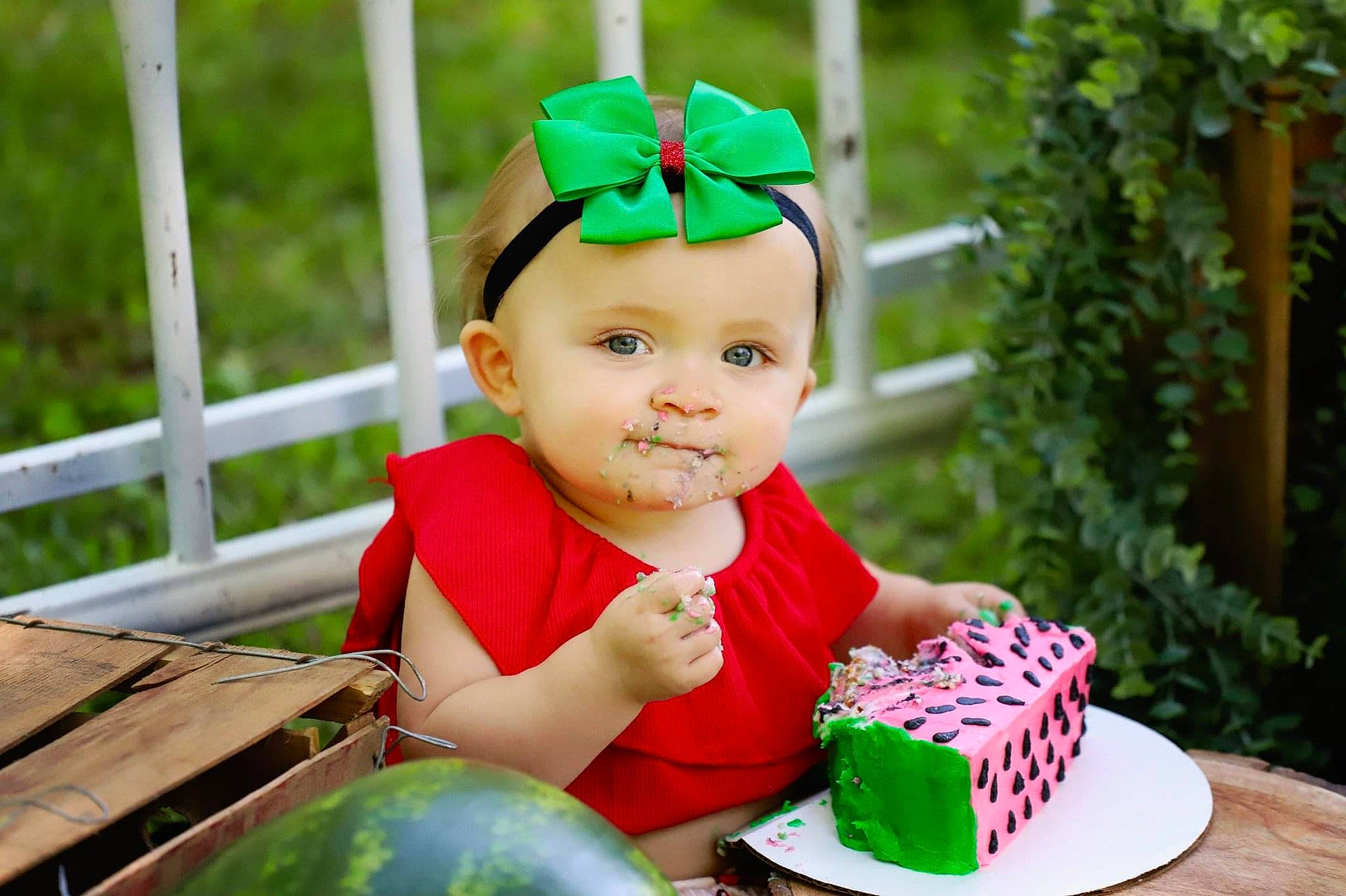 Kimberly joined the competition — help win amazing prizes! baby, baby_toddler_clothing, birthday, birthday_cake, cake_decorating_supply, child, clothing, event, face, food, fun, grass, green, happy, headwear, leisure, person, pink, plant, smile