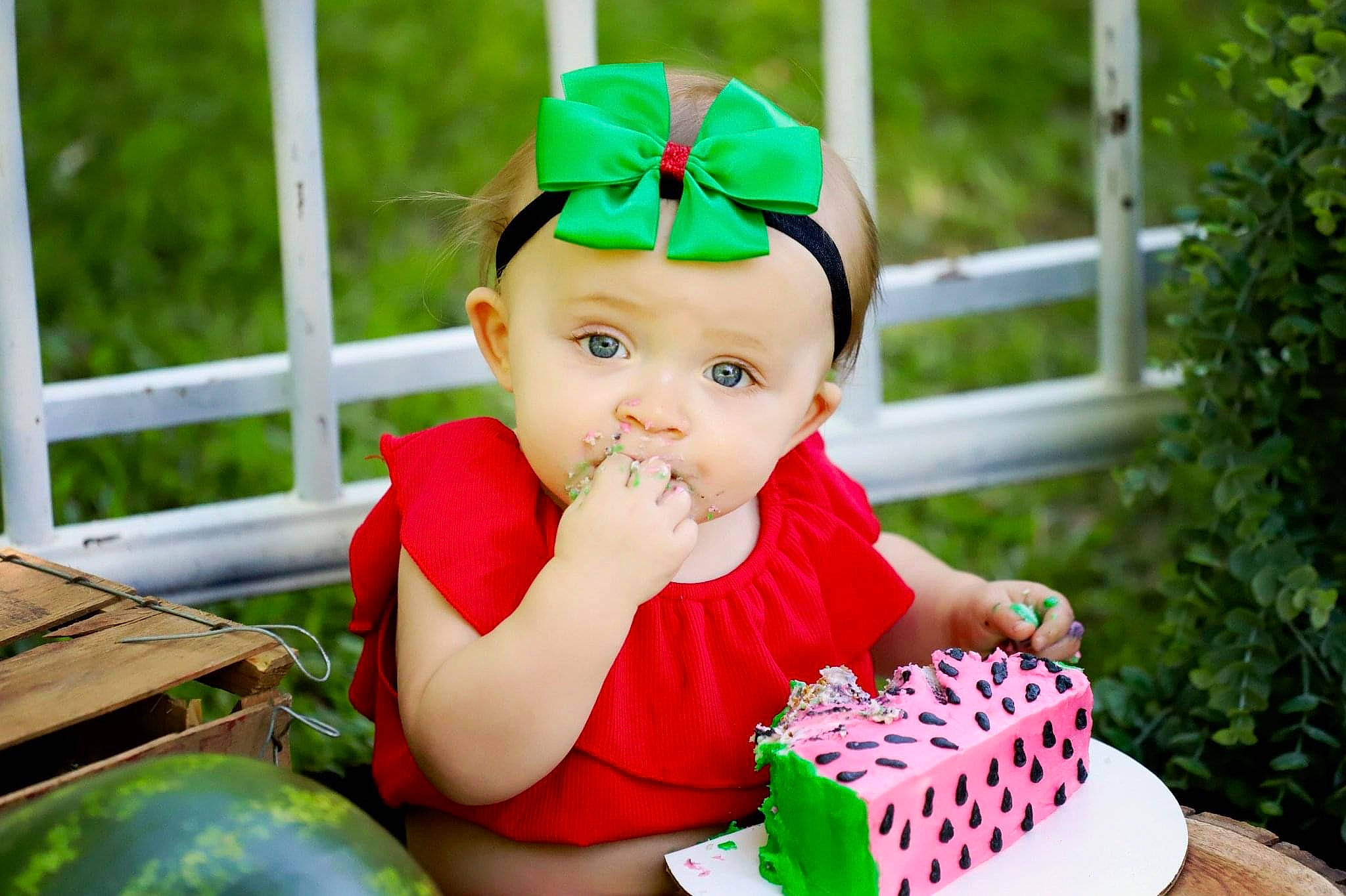 Kimberly joined the competition — help win amazing prizes! baby, baby_toddler_clothing, birthday_cake, cake, cake_decorating_supply, child, clothing, dessert, event, face, food, fun, grass, green, happy, headwear, person, plant, sugar_cake, sweetness