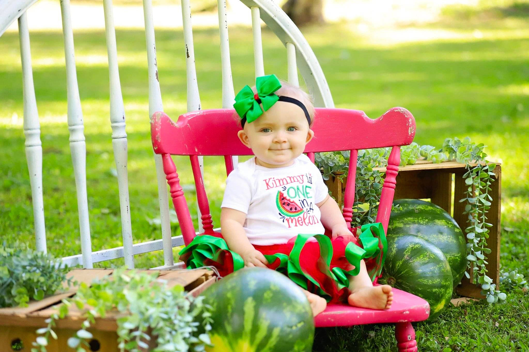 Kimberly is registered to the contest to win money with this photo: baby, baby_toddler_clothing, child, event, face, fun, garden, grass, green, happy, headwear, joy, lawn, leisure, magenta, people_in_nature, person, photograph, plant, recreation