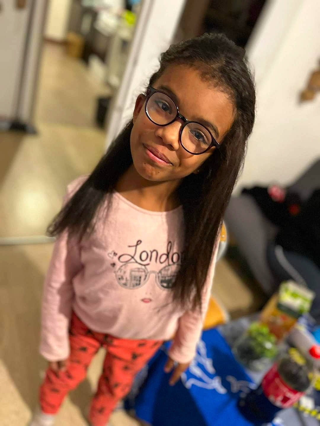 Zamina participe au concours pour gagner de l'argent avec cette photo : black_hair, child, event, eyewear, fashion_design, fun, glasses, happy, joy, leisure, long_hair, mouth, party, person, recreation, room, sleeve, smile, t_shirt, top