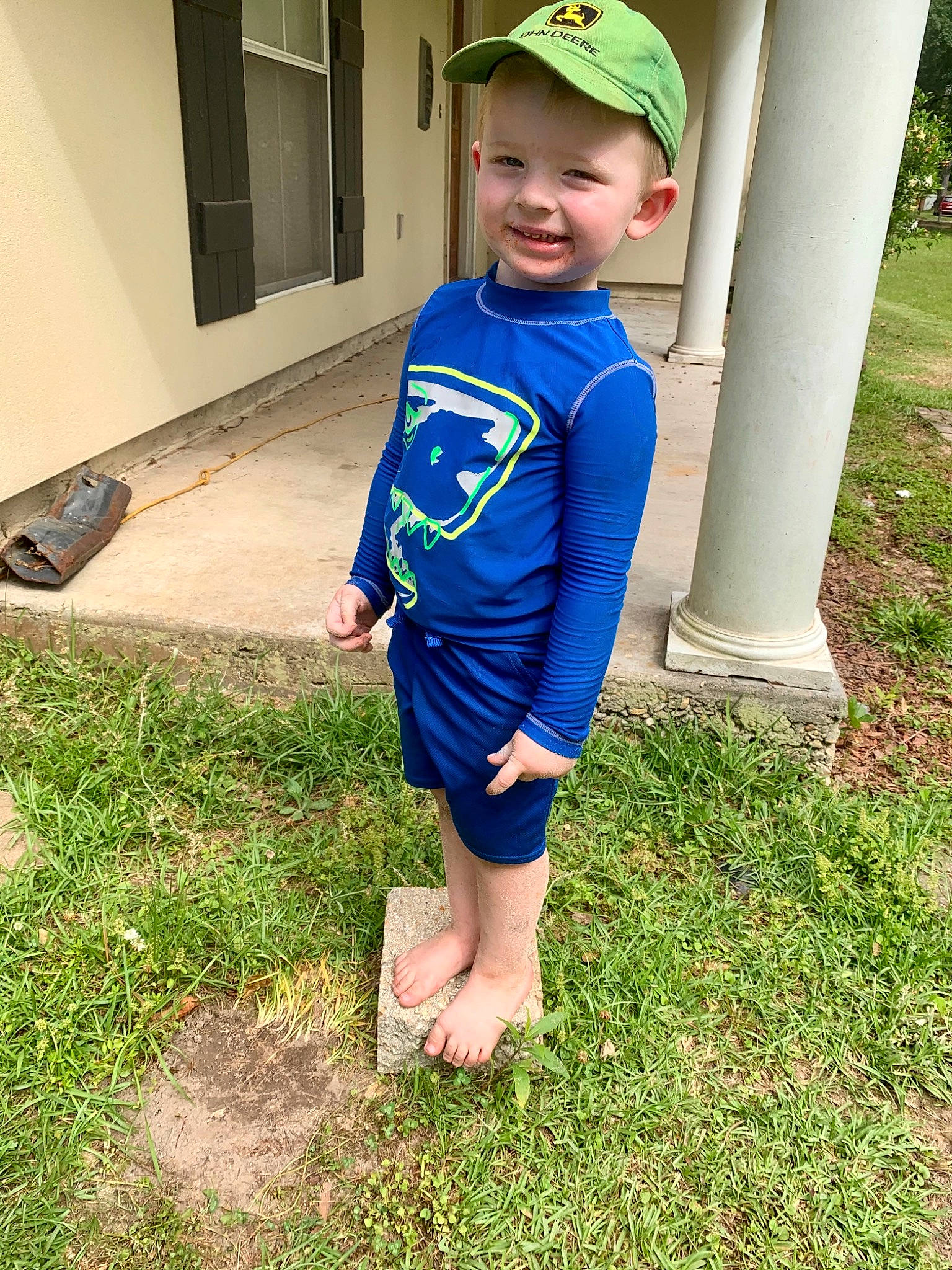 Brysen joined the competition — help win amazing prizes! baby_toddler_clothing, cap, child, clothing, electric_blue, fun, grass, headwear, joy, leg, mammal, people_in_nature, person, plant, sleeve, smile, sportswear, standing, t_shirt, toddler