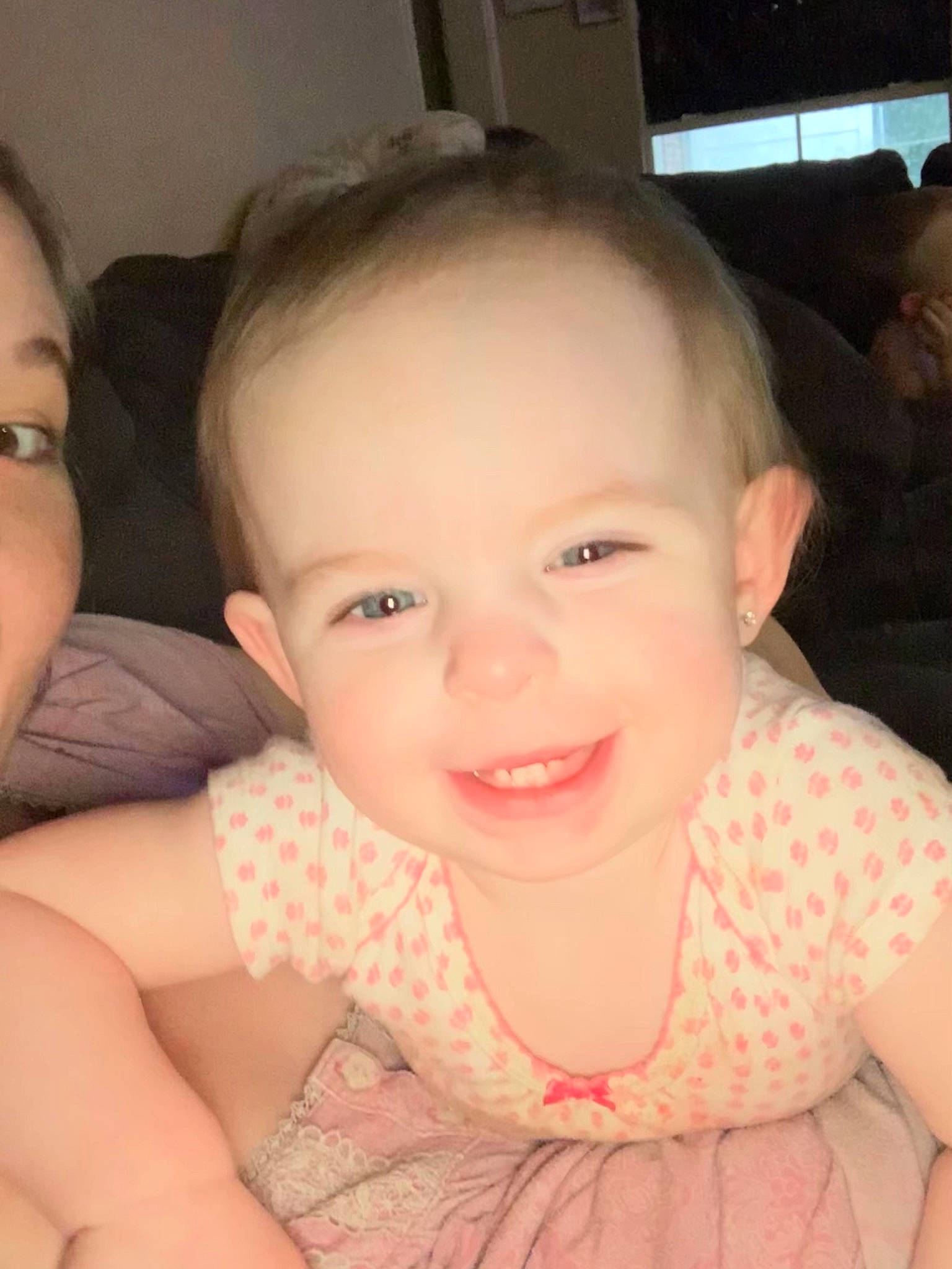 Blakely is registered to the contest to win money with this photo: arm, baby_toddler_clothing, cheek, ear, eye, eyebrow, eyelash, forehead, gesture, hairstyle, happy, human_body, iris, joy, lip, mouth, neck, nose, person, skin