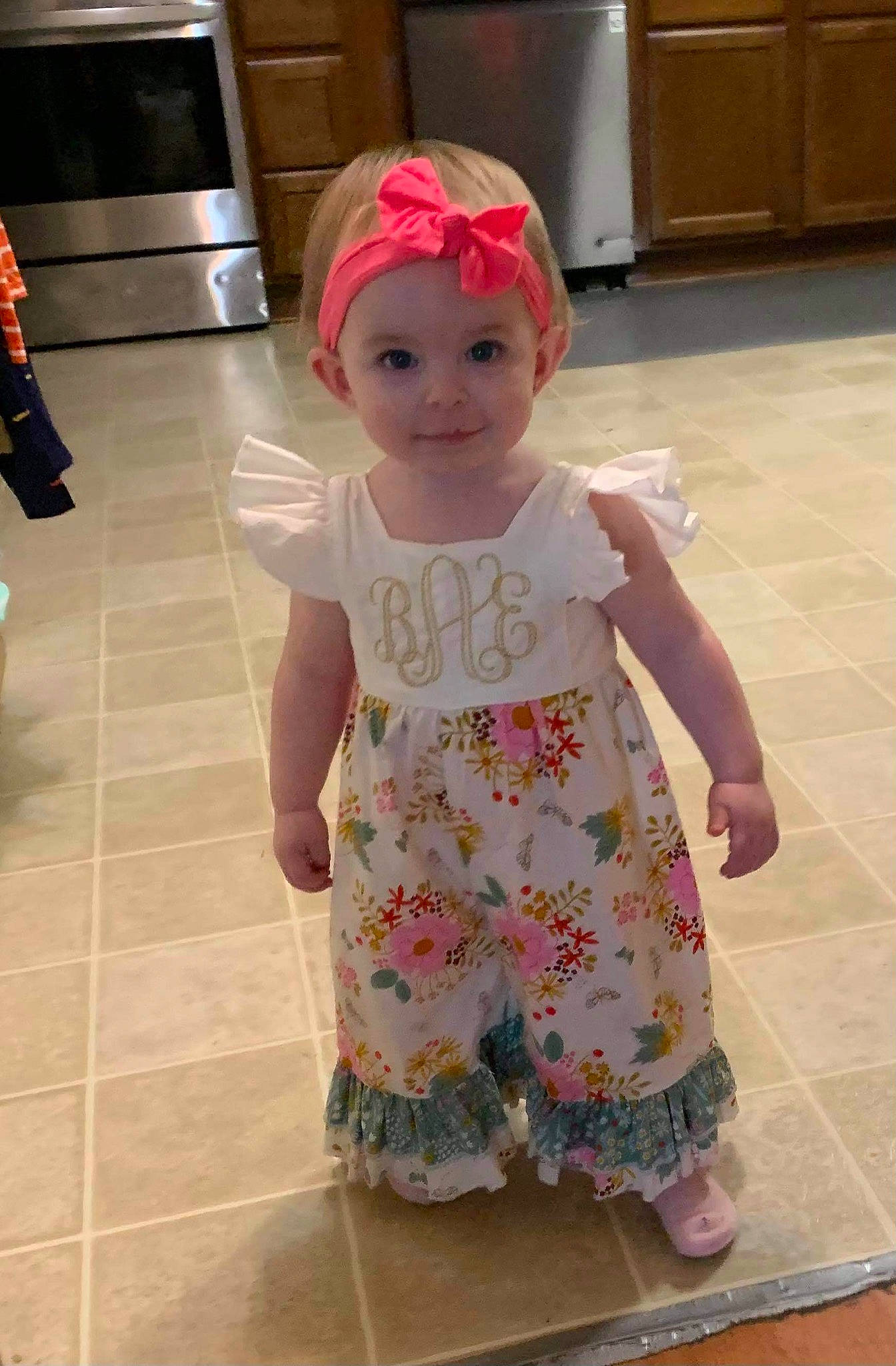 Blakely joined the competition — help win amazing prizes! arm, baby, baby_toddler_clothing, cabinetry, cap, child, dress, floor, flooring, happy, hat, head, headwear, joint, person, pink, skin, sleeve, smile, t_shirt