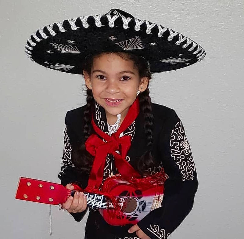 Coco joined the competition — help win amazing prizes! fashion_accessory, girl, hat, headgear, joy, outerwear, person, product, smile, sombrero