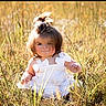 Oakley joined the competition — help win amazing prizes! toddler, child, baby, girl, white_dress, outdoor, meadow, grass, field, sunlight, portrait, sitting, smiling, face, hair, ponytail, nature, summer, peaceful, photography