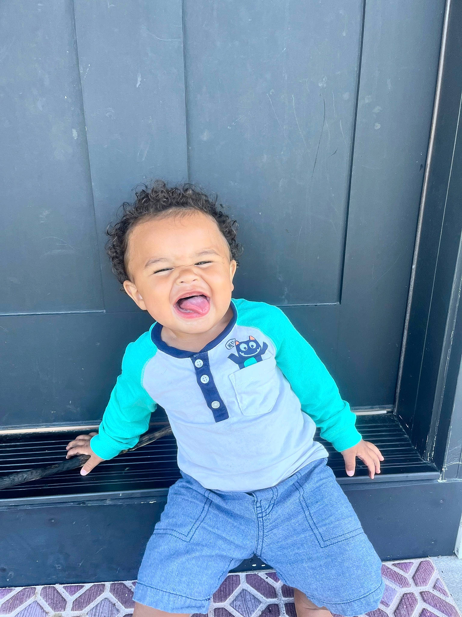 Jett joined the competition — help win amazing prizes! arm, child, electric_blue, finger, flash_photography, football, fun, happy, human_body, human_leg, joint, knee, leg, leisure, person, plaid, shoulder, sitting, sports_equipment, thigh