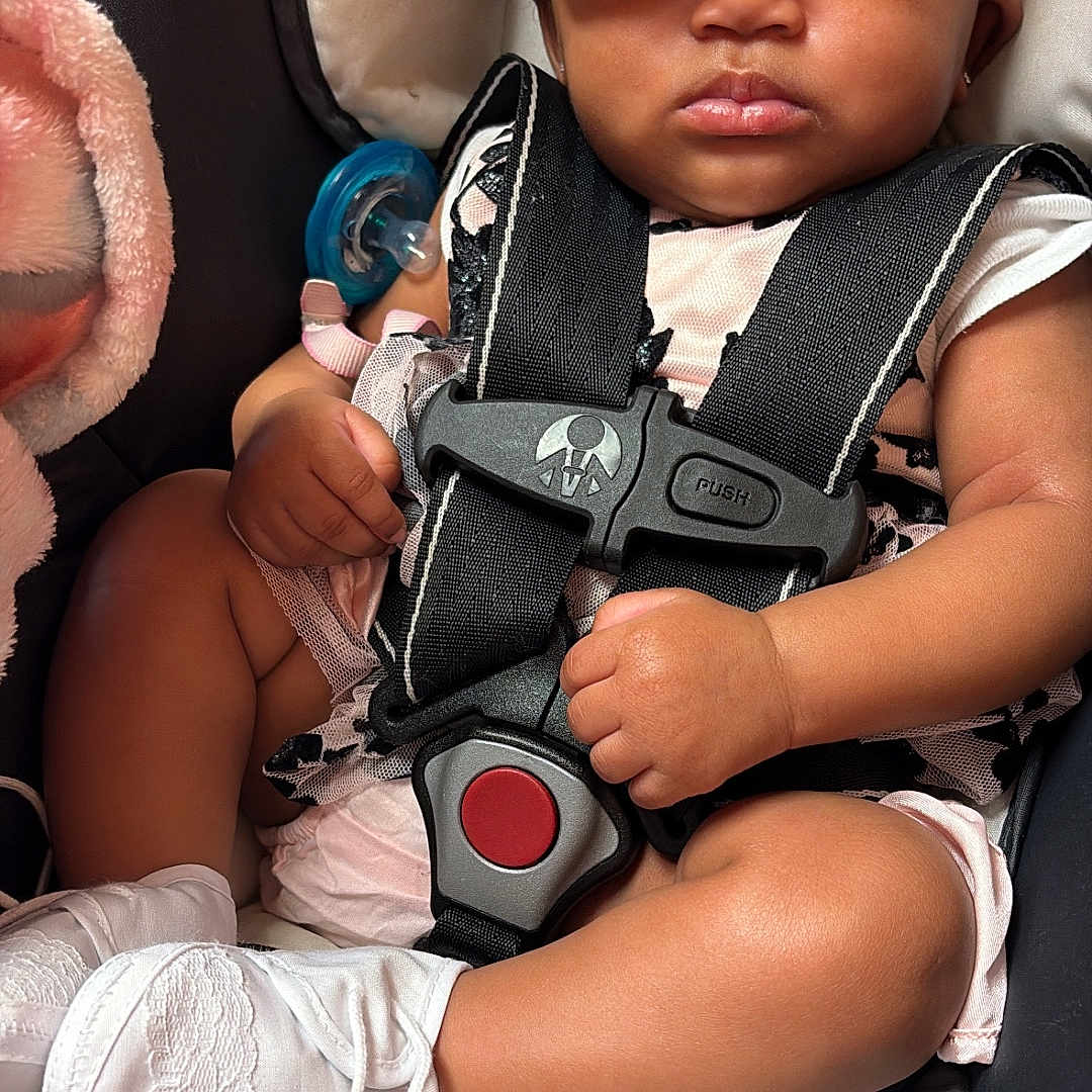 Xialani joined the competition — help win amazing prizes! baby, infant, car_seat, headband, flower, sleeping, closed_eyes, safety_harness, white_booties, cute, child, toddler, skin, clothing, seatbelt, resting, indoors, adorable, portrait, peaceful
