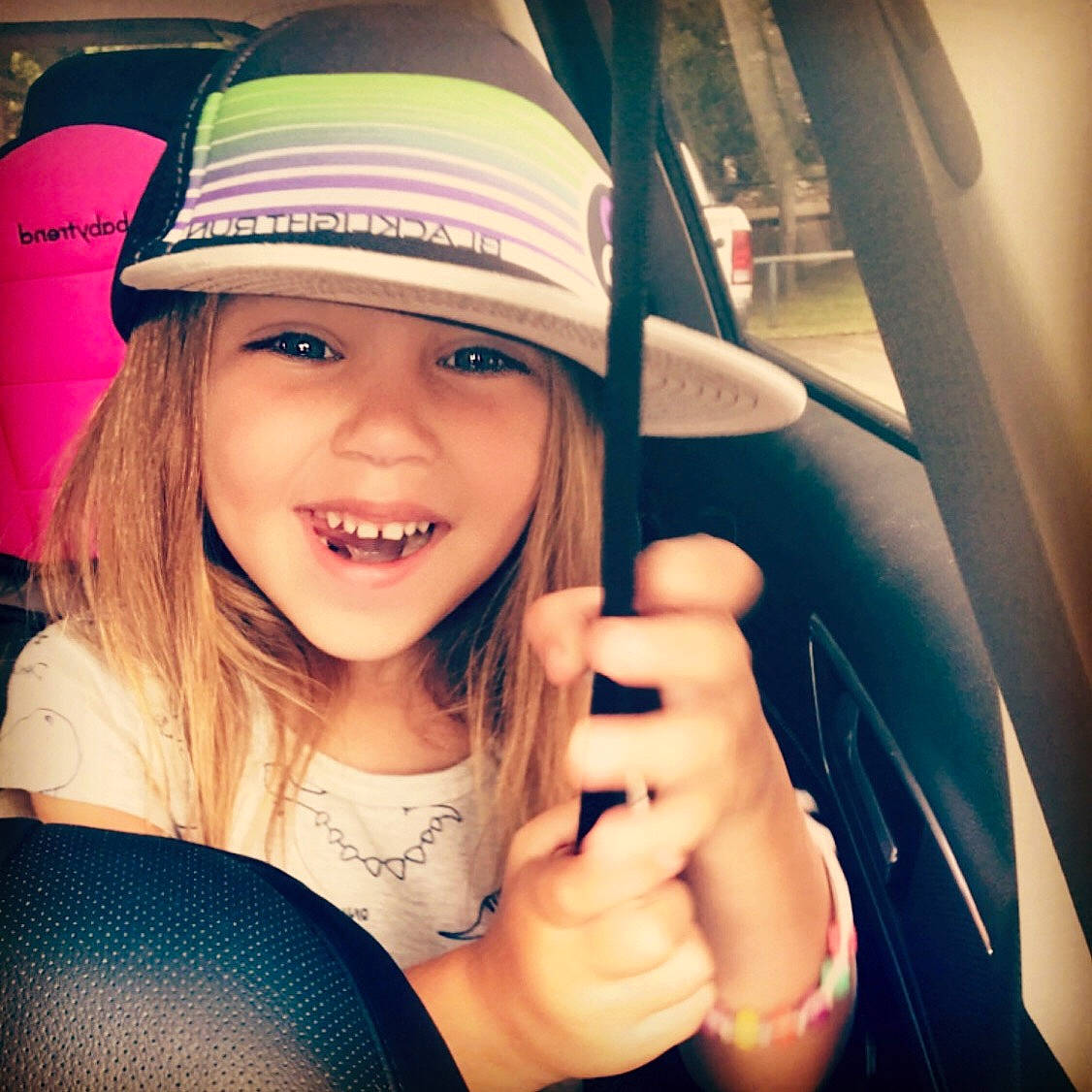 Jordynn is registered to the contest to win money with this photo: cap, cool, eyebrow, eyewear, finger, flash_photography, fun, gesture, happy, hat, headwear, joy, morning, nail, person, smile, snapshot, steering_wheel, sunlight, thumb
