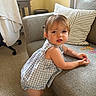 Scotlyn joined the competition — help win amazing prizes! carpet, child, colorful, couch, curtains, dress, expression, face, floor, furniture, hair, home, indoor, person, pillow, standing, table, toddler, toy, window