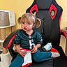 Scotlyn is registered to the contest to win money with this photo: blue_pants, boot, casual_clothing, cat_scratch_post, child, curious_expression, furniture, gaming_chair, hair, indoor, person, pigtails, red_black_chair, seated, sippy_cup, sock, sports_jersey, toddler, toy, yellow_wall