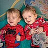 toddlers, children, twins, smiling, portrait, indoor, play_tent, colorful, spider_man_costume, pajamas, red_clothing, stuffed_elephant, plush_toy, sitting, happy, siblings, blonde_hair, baby, playroom, closeup