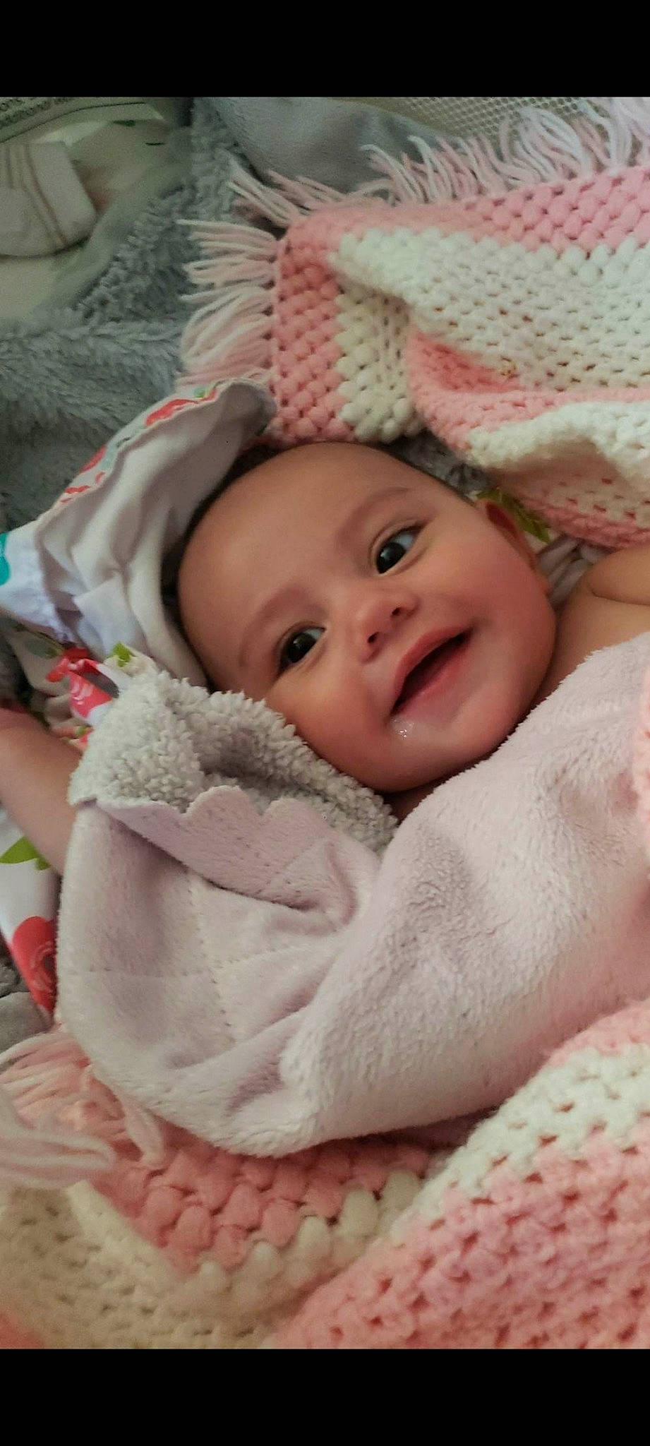 Ava'Rae is registered to the contest to win money with this photo: baby, baby_sleeping, baby_toddler_clothing, cheek, child, chin, comfort, eye, fur, happy, headgear, headwear, joy, linens, lip, person, pink, skin, sleeve, smile